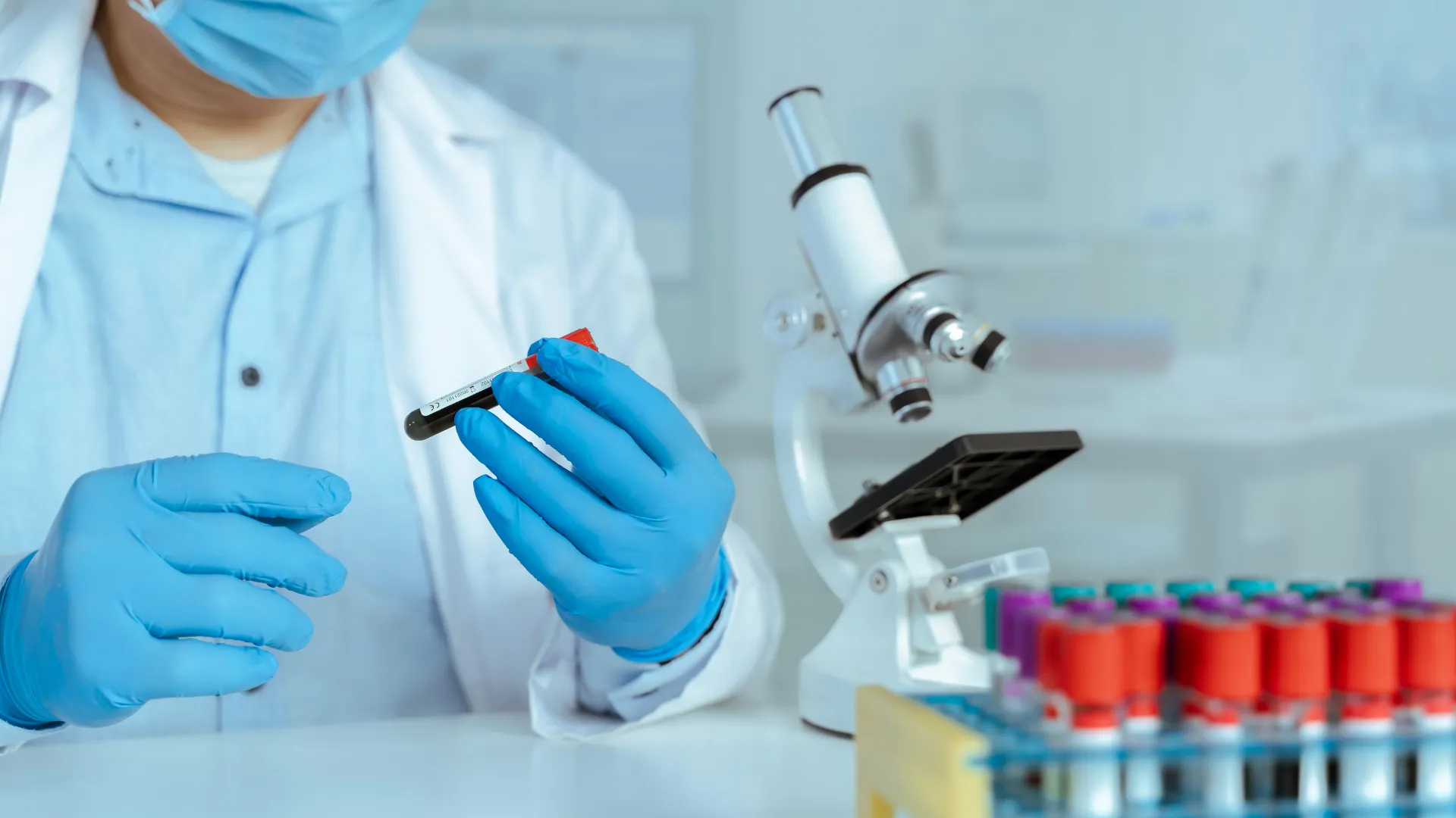 Scientist examining a sample in the lab